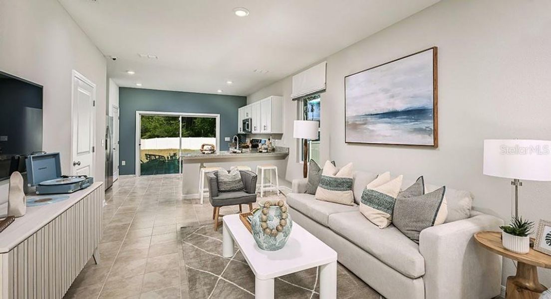 Furnished interior view inside a new home in Westview Community Group Page, Kissimmee (Image 6).
