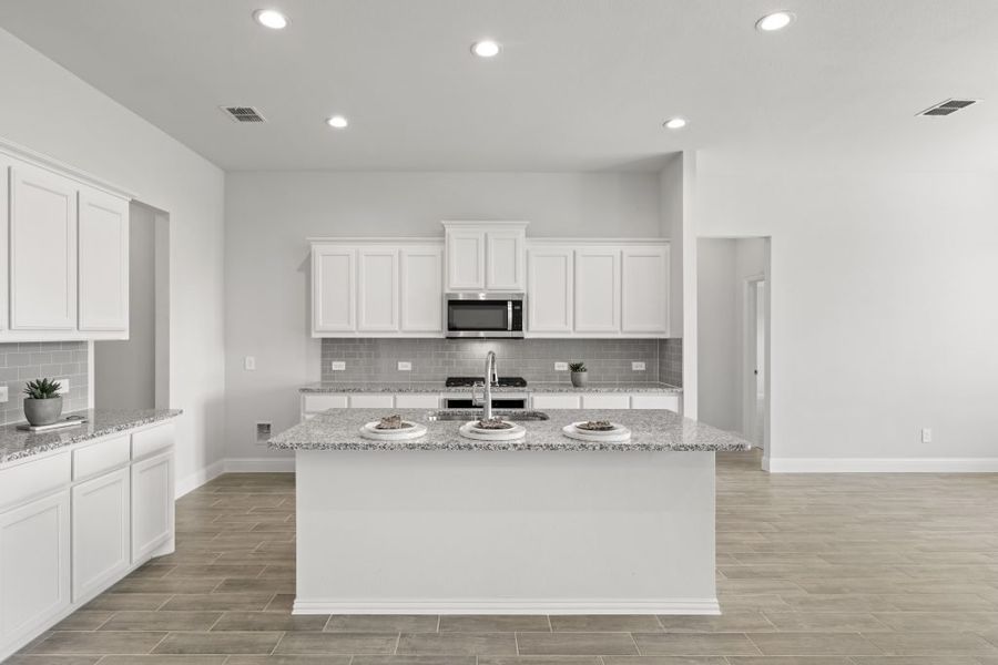 Representative exterior photo of a completed home built from the Hampton by Impression Homes in Timberbrook, Justin, TX (Image 4). Representative exterior photo of a completed home built from the Hampton by Impression Homes in Timberbrook, Justin, TX (Image 4).