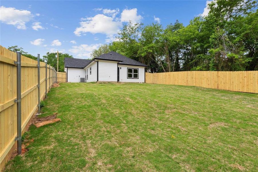 Exterior details and patio area of a home in , Denison (Image 17). Exterior details and patio area of a home in , Denison (Image 17).