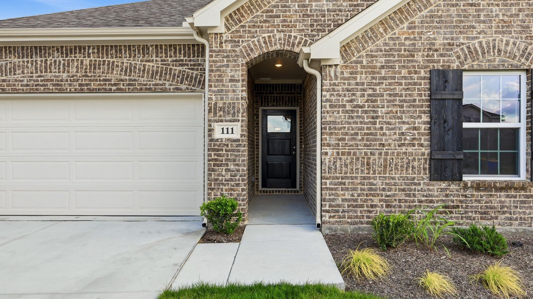 Exterior details and patio area of a home in Patriot Estates, Venus (Image 3).