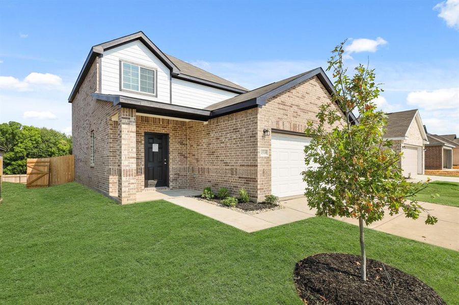 Front exterior of a new home in Christian Meadows, Ennis, TX, highlighting curb appeal (Image 14). Front exterior of a new home in Christian Meadows, Ennis, TX, highlighting curb appeal (Image 14).