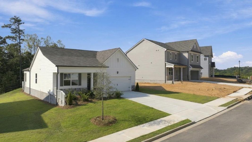 Front exterior of a new home in South Wind, Union City, GA, highlighting curb appeal (Image 18).