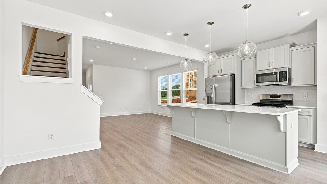 Inviting breakfast area with a seamless connection to the kitchen for everyday living Inviting breakfast area with a seamless connection to the kitchen for everyday living