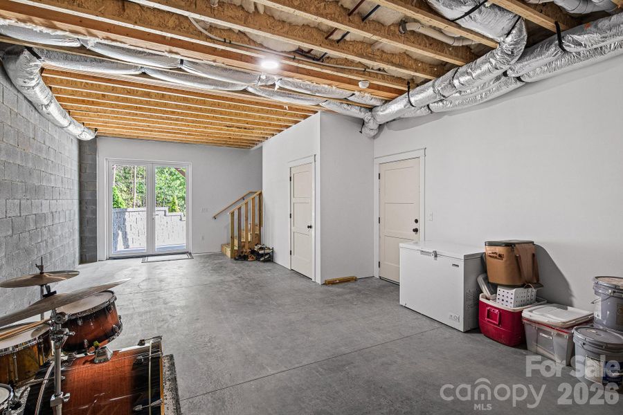Unfinished lower level with potential to add future bedroom and full bathroom