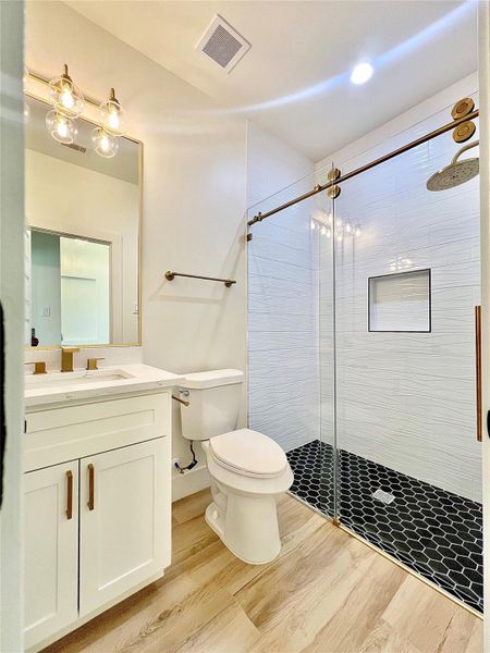 3rd. Full Bathroom adjacent to the 4th. Bedroom and Entry way.