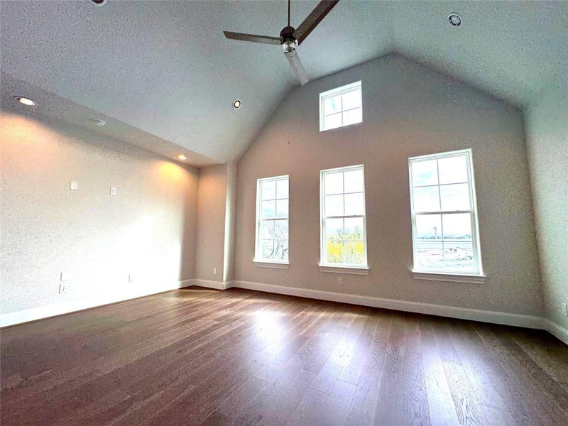 LARGE primary bedroom with high ceilings and tons of natural light!