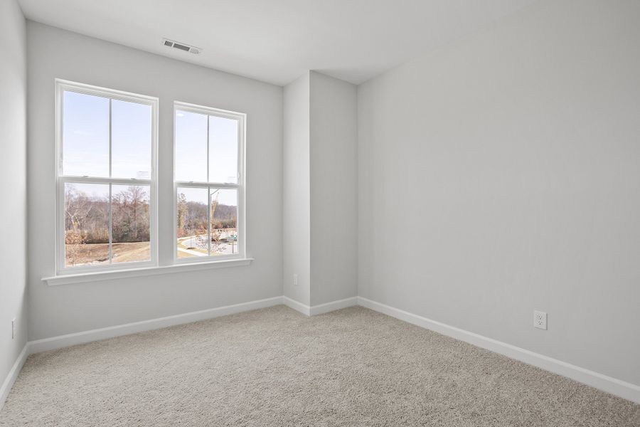 Spacious, unfurnished interior of a new home in Renaissance at White Oak, Garner (Image 26).