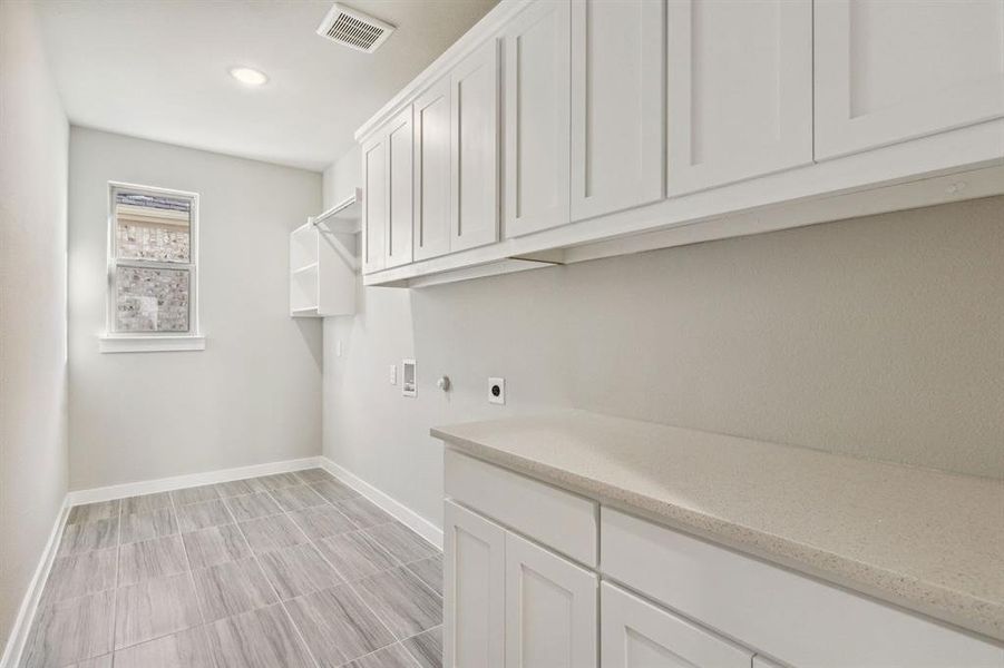 Utility Room in the Morrison home plan by Trophy Signature Homes – REPRESENTATIVE PHOTO Utility Room in the Morrison home plan by Trophy Signature Homes – REPRESENTATIVE PHOTO