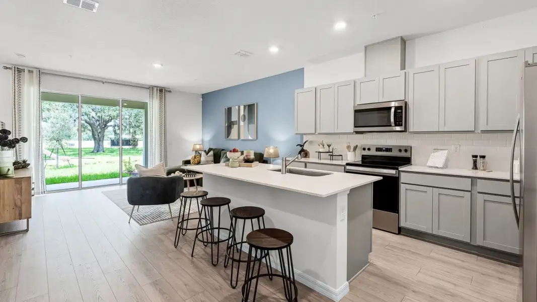 Furnished interior view inside a new home in Towns at Summit, Deland (Image 4).