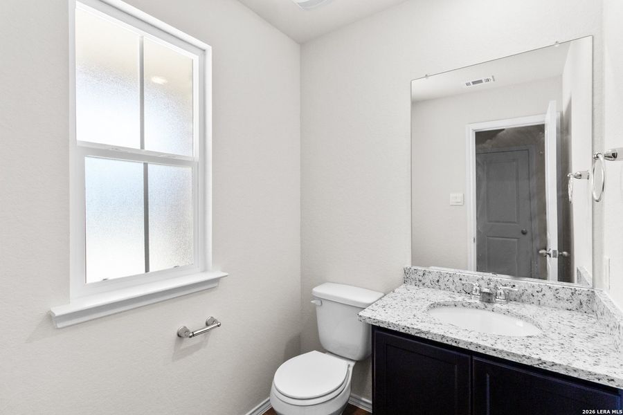 Furnished interior view inside a new home in Redbird Ranch, San Antonio (Image 11).