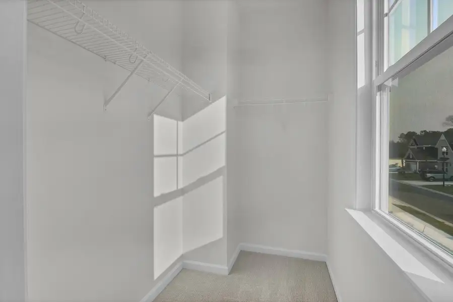 Spacious, unfurnished interior of a new home in Indigo at Abbey Preserve, Wilmington (Image 31).