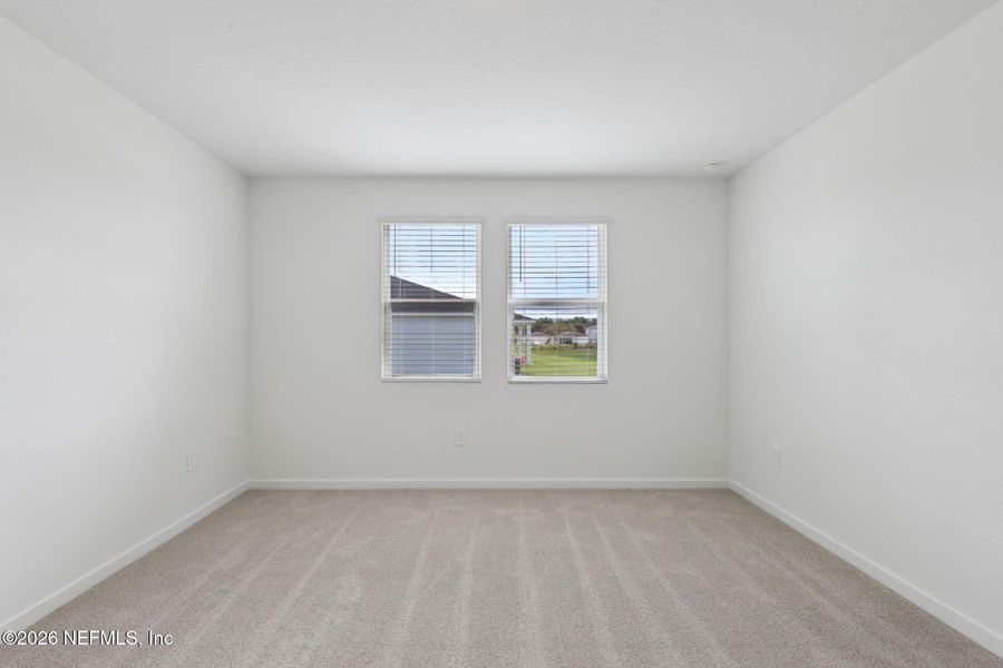 Spacious, unfurnished interior of a new home in Colbert Landings, Palm Coast (Image 35).