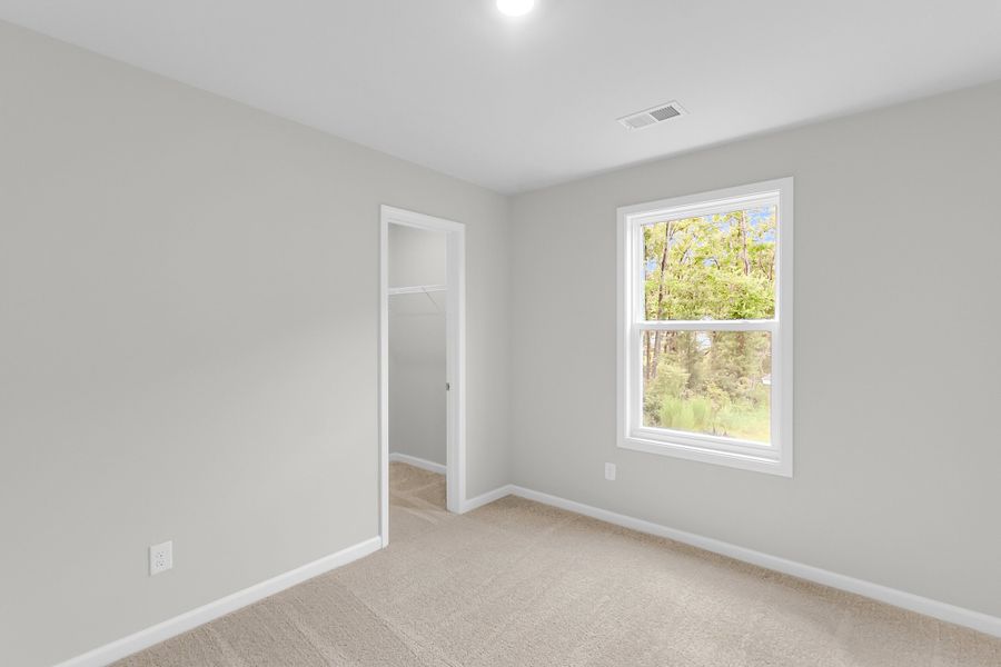 Spacious, unfurnished interior of a new home in Central Creek, Goose Creek (Image 32).