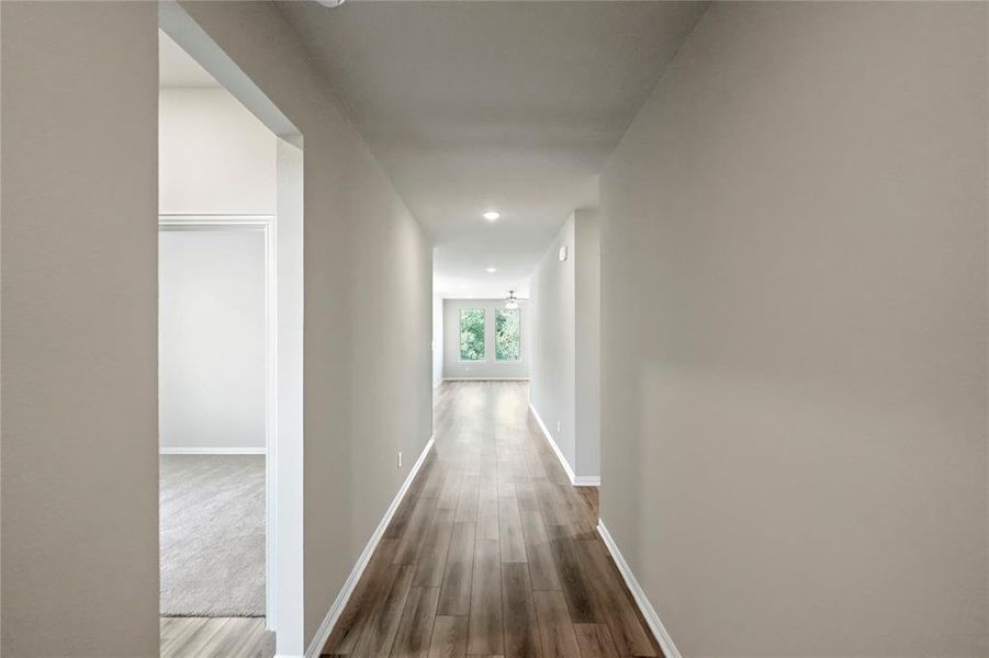 Hall with dark carpet