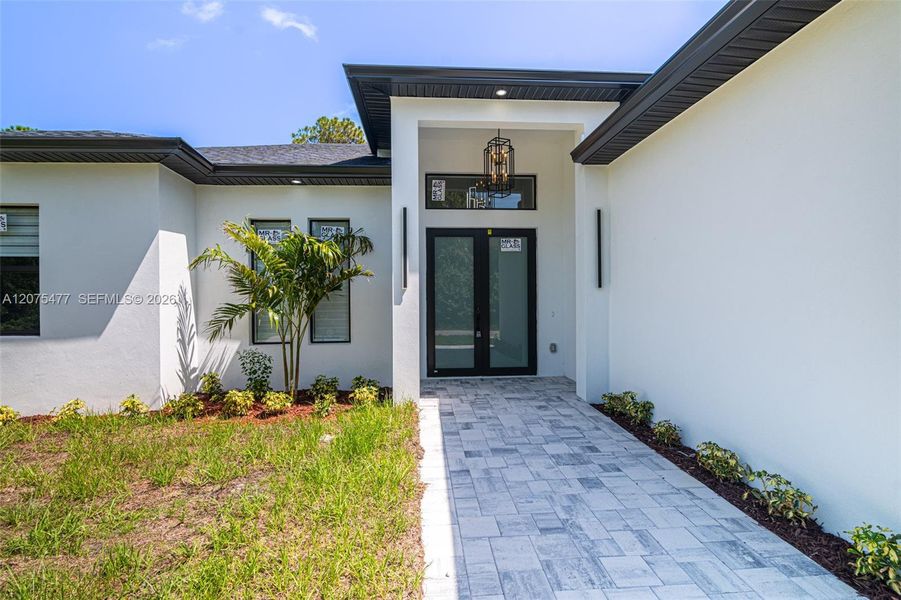 Exterior details and patio area of a home in , Lehigh Acres (Image 45). Exterior details and patio area of a home in , Lehigh Acres (Image 45).