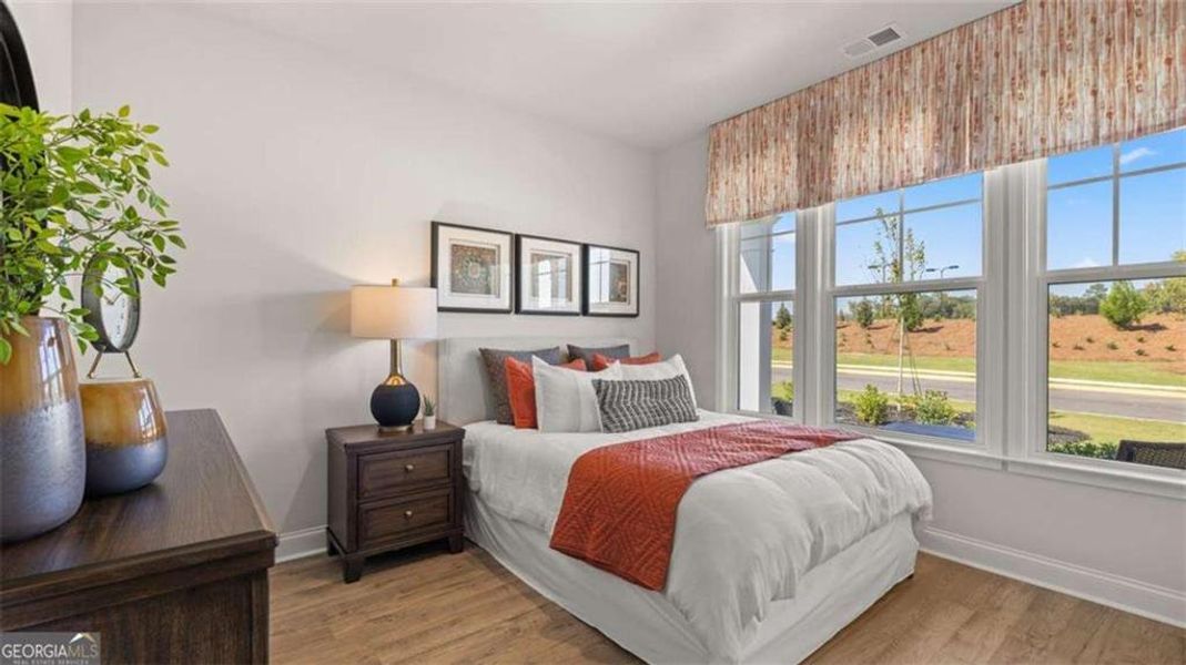 Furnished interior view inside a new home in Oak Ridge Meadows - Active Adult, Locust Grove (Image 6).