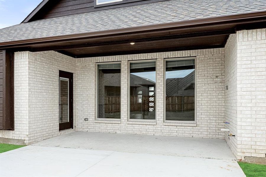 Exterior details and patio area of a home in ArrowBrooke, Aubrey (Image 27). Exterior details and patio area of a home in ArrowBrooke, Aubrey (Image 27).