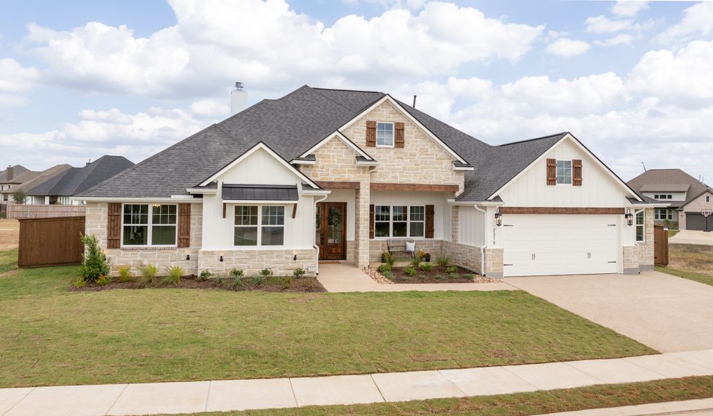 Front exterior of a home in the Stella Ranch community, located in Bryan, TX (Image 2).