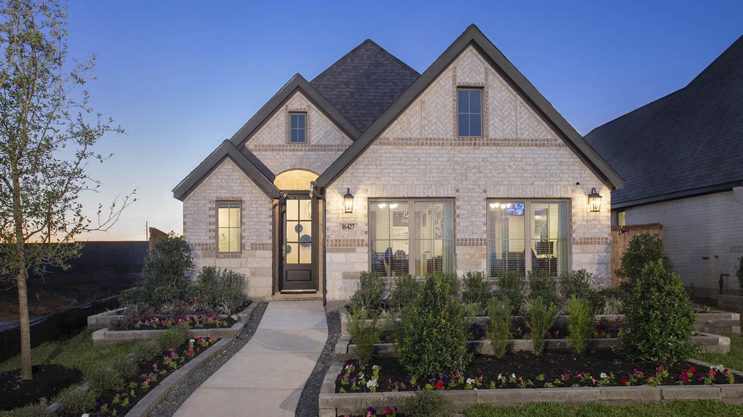 Front exterior of a new home in Brookewater, Rosenberg, TX, highlighting curb appeal (Image 22).