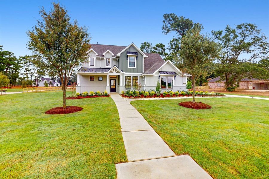 Front exterior of a new home in Sorella, Tomball, TX, highlighting curb appeal (Image 18).