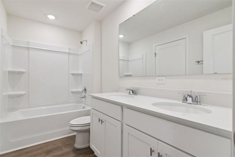 Furnished interior view inside a new home in Vineland Reserve, Osteen (Image 9).