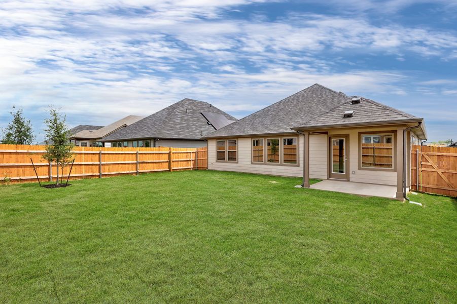 Exterior details and patio area of a home in Prairie Winds, Hutto (Image 22).