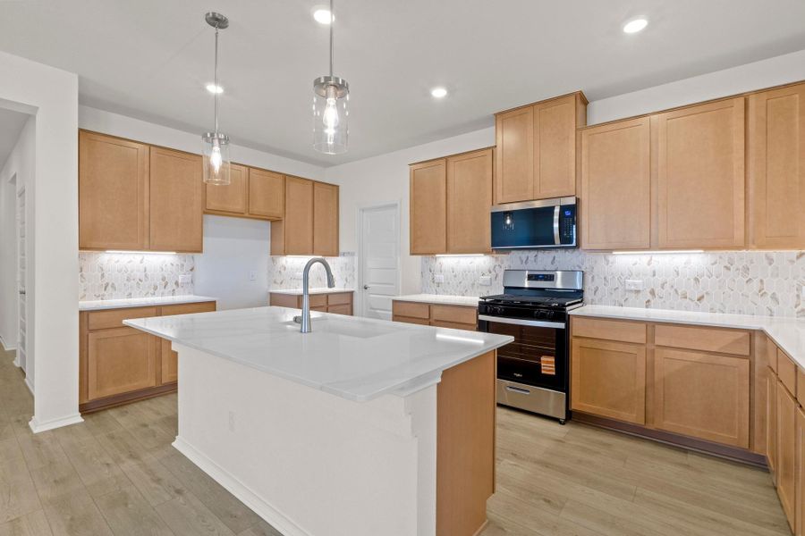 Furnished interior view inside a new home in Salerno - Classic Collection, Round Rock (Image 7). Furnished interior view inside a new home in Salerno - Classic Collection, Round Rock (Image 7).
