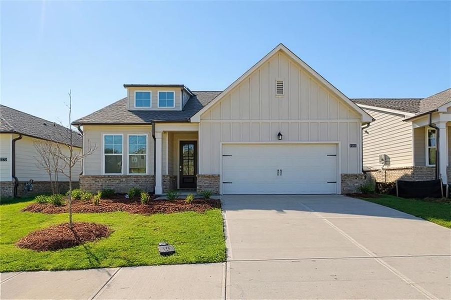 Front exterior of a new home in Kelly Preserve, Loganville, GA, highlighting curb appeal (Image 5).