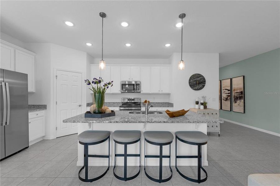 Furnished interior view inside a new home in Covered Bridge at Liberty Bluff, Haines City (Image 23).