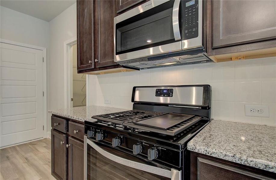 Furnished interior view inside a new home in Crofton Place Enclave, Snellville (Image 9). Furnished interior view inside a new home in Crofton Place Enclave, Snellville (Image 9).