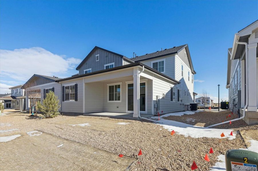 Front exterior of a new home in Skyview at High Point, Aurora, CO, highlighting curb appeal (Image 23). Front exterior of a new home in Skyview at High Point, Aurora, CO, highlighting curb appeal (Image 23).