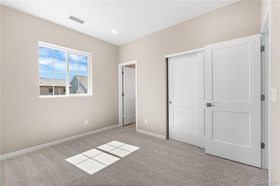 Spacious, unfurnished interior of a new home in Harmony at Solstice, Littleton (Image 27).