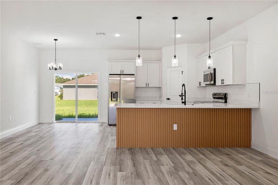 Furnished interior view inside a new home in , Ocala (Image 6).