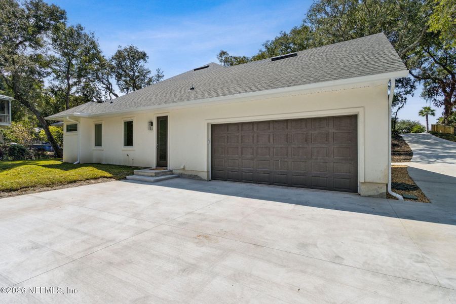 Front exterior of a new home in , Fernandina Beach, FL, highlighting curb appeal (Image 1). Front exterior of a new home in , Fernandina Beach, FL, highlighting curb appeal (Image 1).