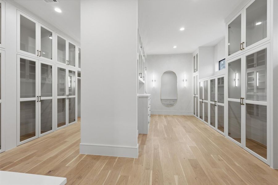 Large primary his and hers closet