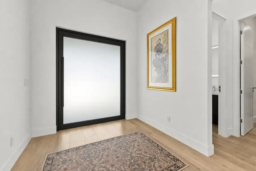 Pivot front entry door