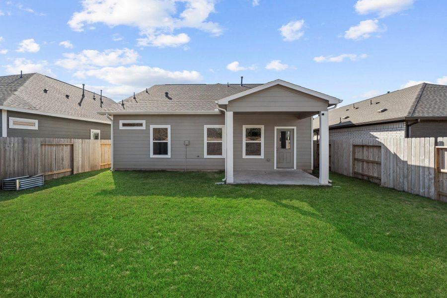 Exterior details and patio area of a home in Jones Creek Reserve, Richmond (Image 15).