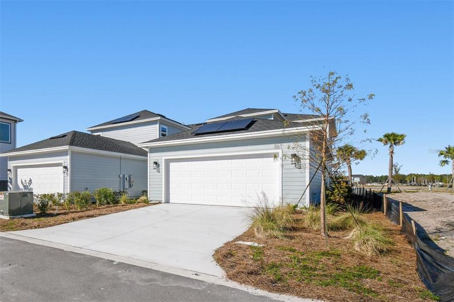 Front exterior of a new home in , St. Cloud, FL, highlighting curb appeal (Image 25). Front exterior of a new home in , St. Cloud, FL, highlighting curb appeal (Image 25).