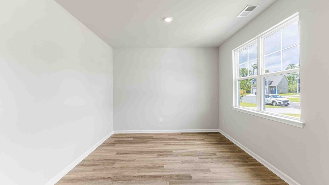 Spacious, unfurnished interior of a new home in Cedar Hill Landing, Navassa (Image 17). Spacious, unfurnished interior of a new home in Cedar Hill Landing, Navassa (Image 17).
