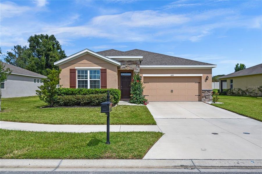 Front exterior of a new home in , Ocala, FL, highlighting curb appeal (Image 20).