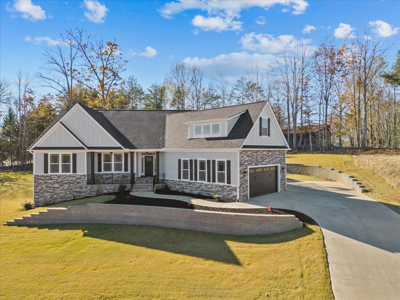 Representative exterior photo of a completed home built from the Drayton Elite by Enchanted Homes in Smokey Hills, Campobello, SC (Image 17).