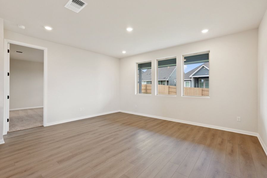 Representative unfurnished interior of a home built from the Texoma by Ashton Woods in The Colony 50s, Bastrop (Image 13).