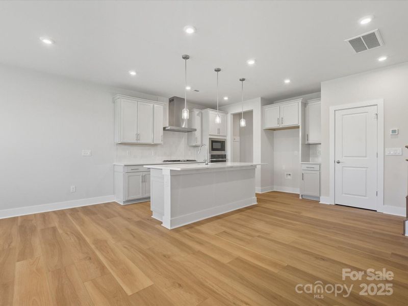 Drawing you in, GE stainless designer appliances pull attention.