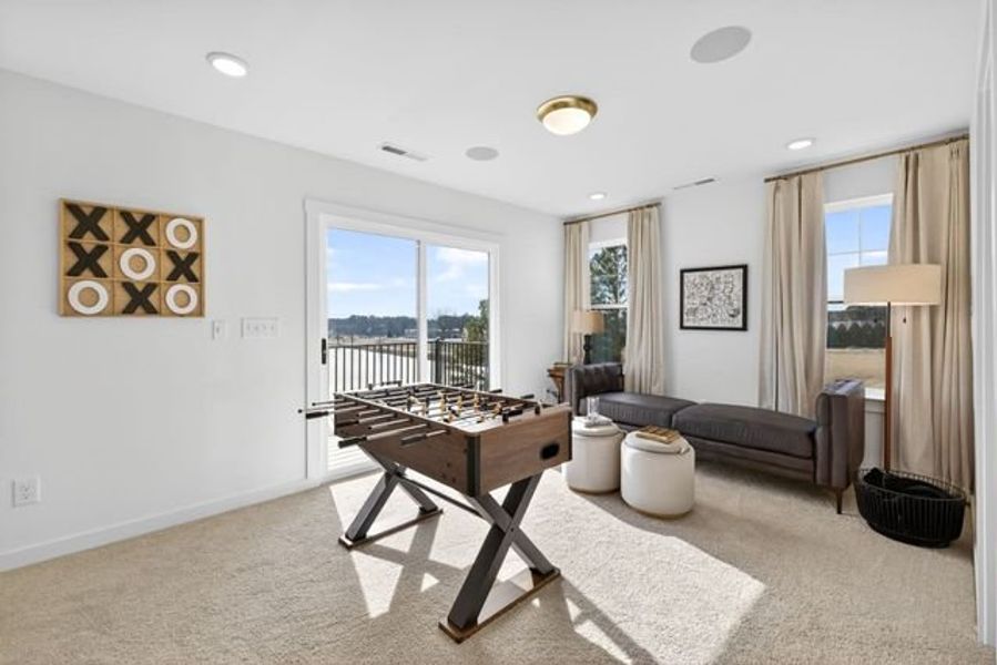 Representative furnished interior of a home built from the Hollis TH by True Homes in North District at Flowers Plantation Townhomes, Clayton (Image 11).