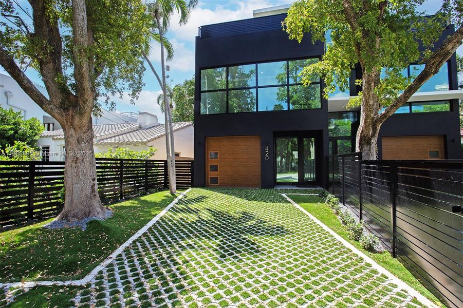 Front exterior of a new home in , Miami, FL, highlighting curb appeal (Image 30).