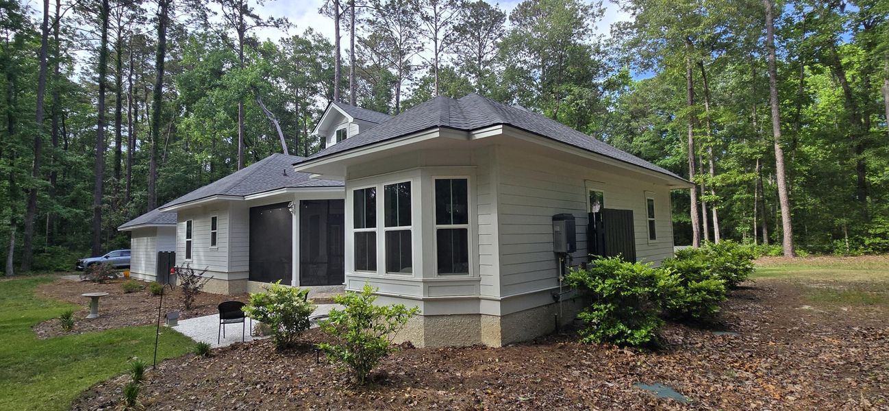 Exterior details and patio area of a home in , Seabrook (Image 23).