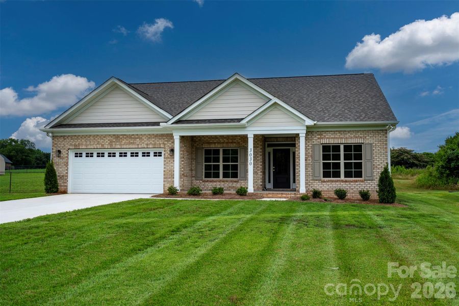 Front exterior of a new home in , Monroe, NC, highlighting curb appeal (Image 2). Front exterior of a new home in , Monroe, NC, highlighting curb appeal (Image 2).