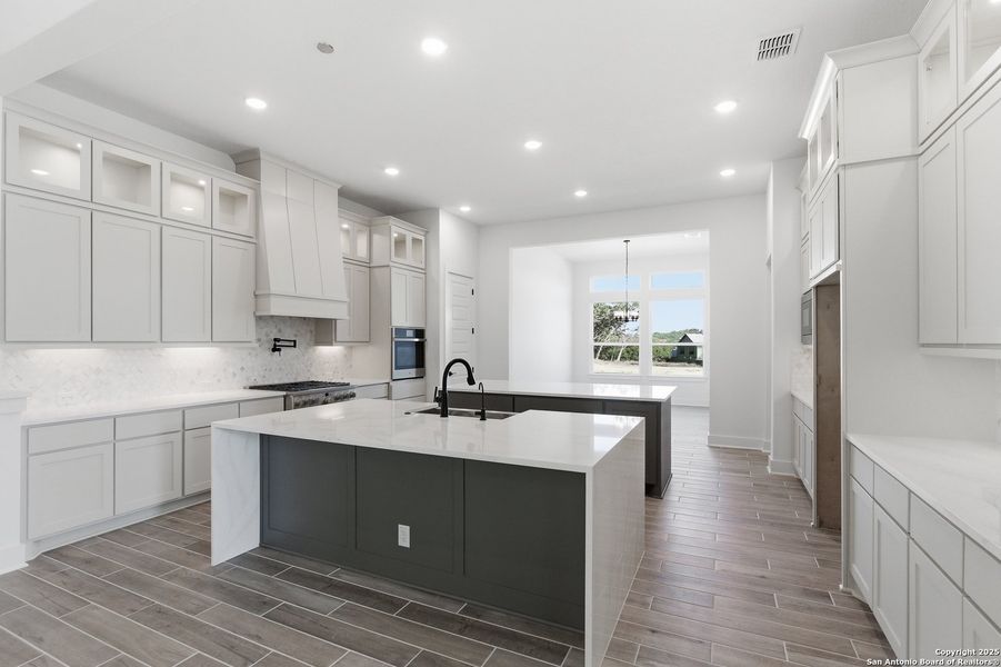 Furnished interior view inside a new home in Caliza Reserve, Boerne (Image 16).