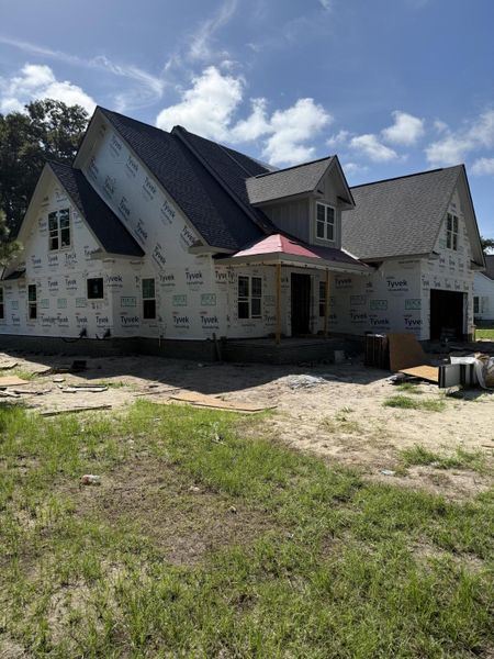 Front exterior of a new home in , Hollywood, SC, highlighting curb appeal (Image 14).
