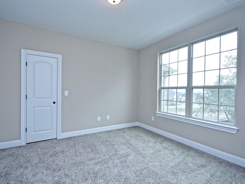 Representative unfurnished interior of a home built from the Madera II by Giddens Homes in Scofield Farms Estates, Georgetown (Image 398).